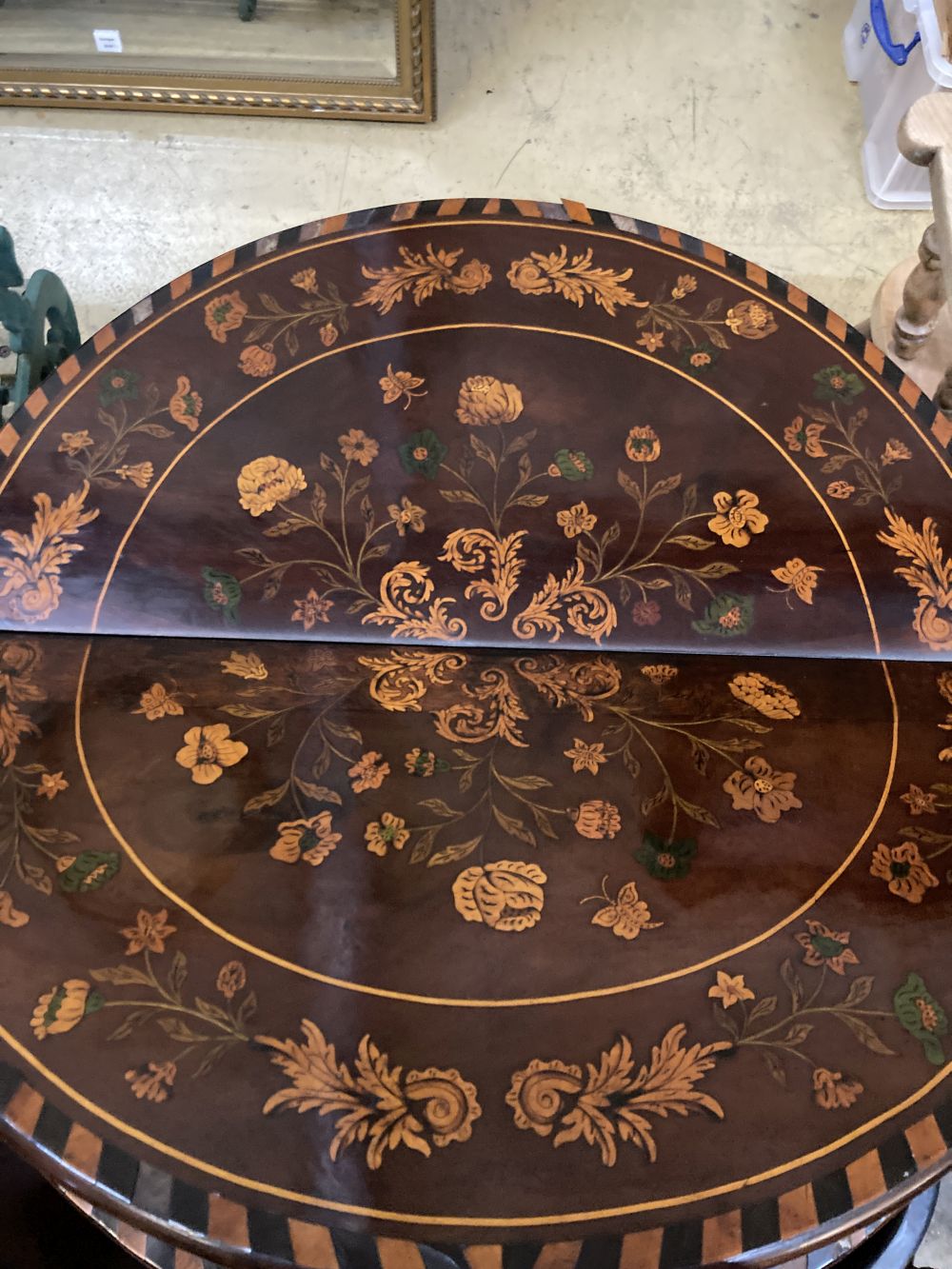 A near pair of 18th century Dutch floral marquetry walnut triple folding tea and card tables, larger 84cm x 40cm height 76cm